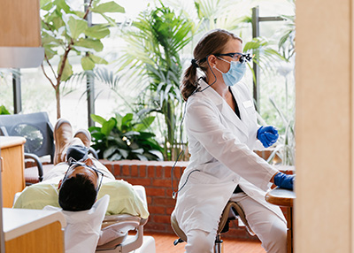 Our Stillwater dentist looking over a patients chart